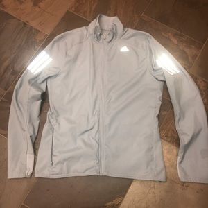 Lightweight reflective Adidas running jacket.